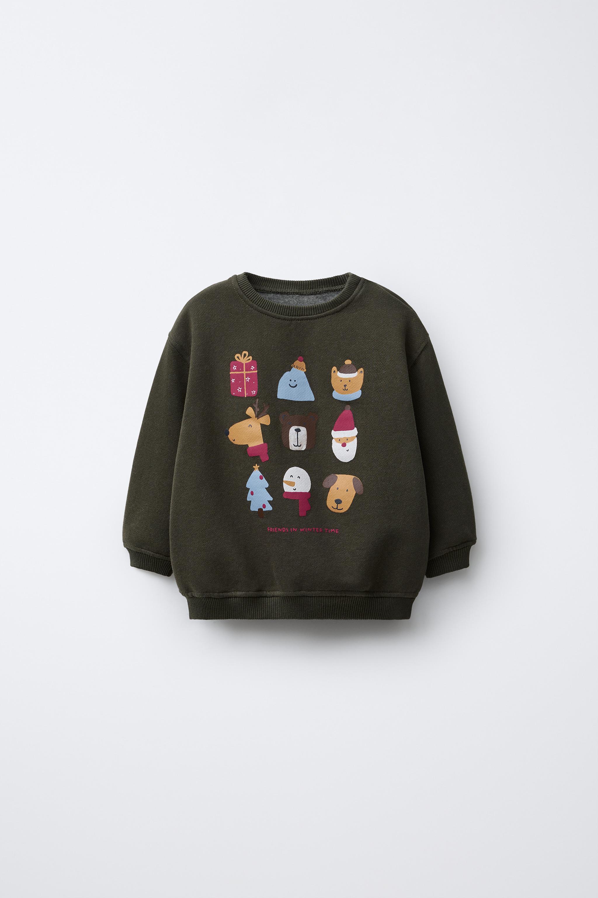 SWEATSHIRT WITH VARIOUS PRINTS